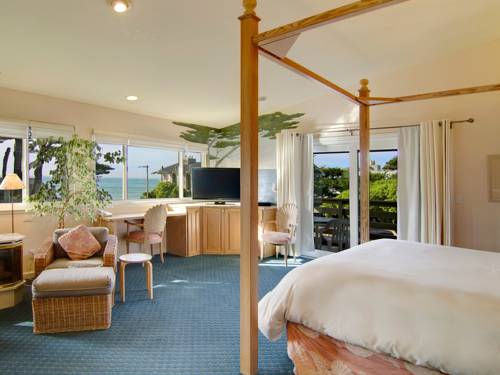 Imagen de la habitación del Hotel Cypress Inn On Miramar Beach. Foto 7