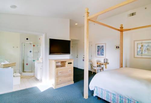 Imagen de la habitación del Hotel Cypress Inn On Miramar Beach. Foto 12