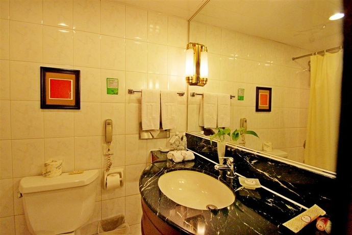 Imagen de la habitación del Hotel Cypress Jin Jiang Shanghai. Foto 3