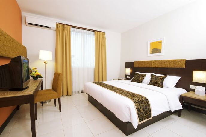 Imagen de la habitación del Hotel D Arcici Cempaka Putih. Foto 9