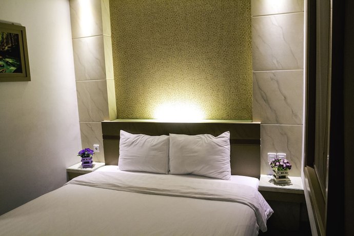 Imagen de la habitación del Hotel D' Calia Tarakan. Foto 8