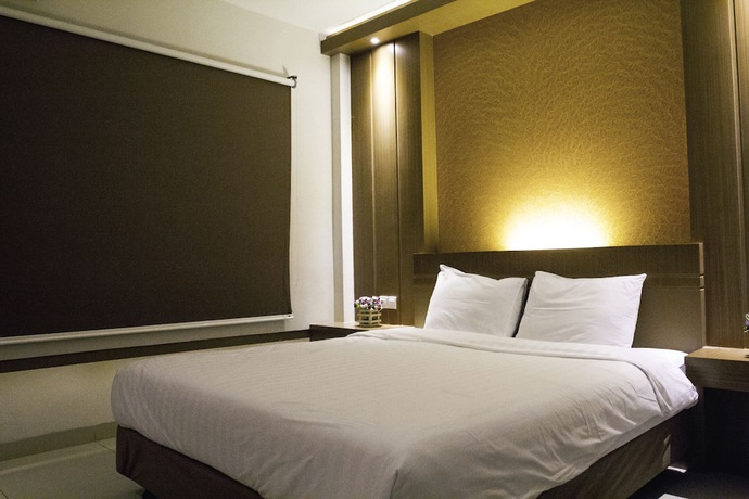 Imagen de la habitación del Hotel D' Calia Tarakan. Foto 10