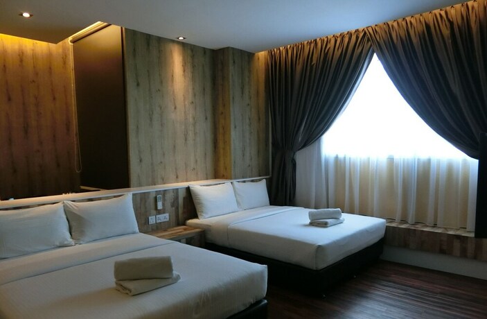 Imagen de la habitación del Hotel D Elegance. Foto 19
