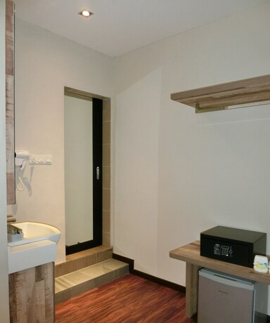 Imagen de la habitación del Hotel D Elegance. Foto 20