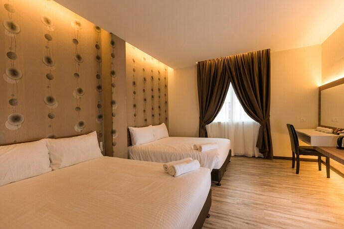 Imagen de la habitación del Hotel D Elegance. Foto 23