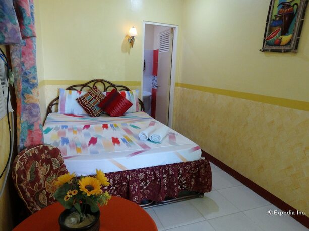 Imagen de la habitación del Hotel D\' Lucky Garden Inn. Foto 18