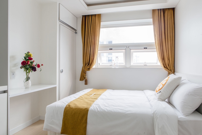 Imagen de la habitación del Hotel D Seven Suites. Foto 11