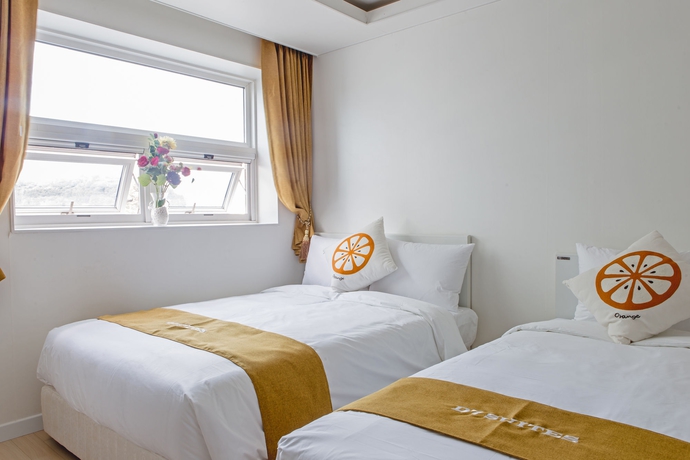 Imagen de la habitación del Hotel D Seven Suites. Foto 13