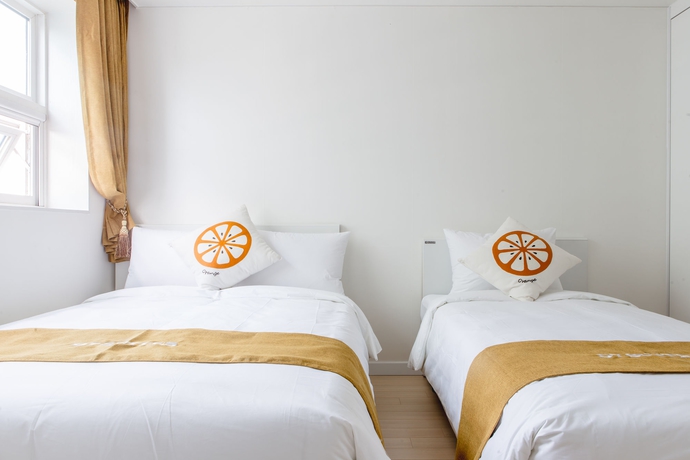 Imagen de la habitación del Hotel D Seven Suites. Foto 14