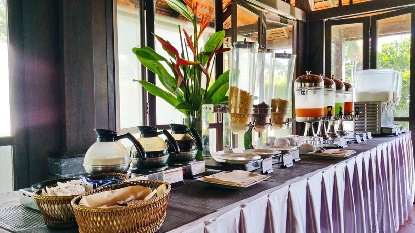 Imagen del bar/restaurante del Hotel D Varee Mai Khao Beach. Foto 1