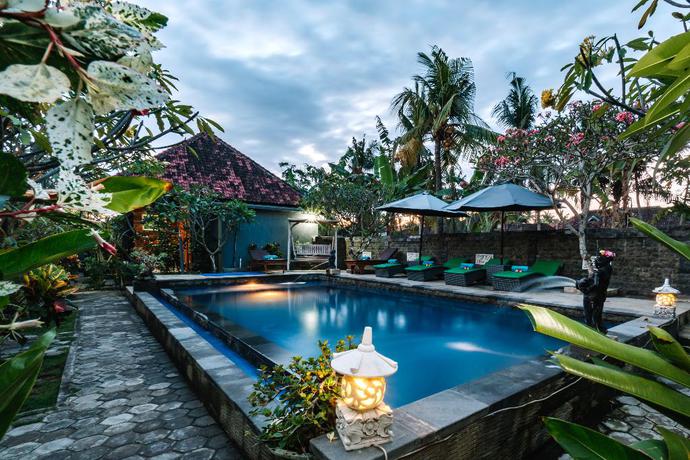 Imagen de la piscina del Hotel D and B Bungalow's By Dewizz Management. Foto 19