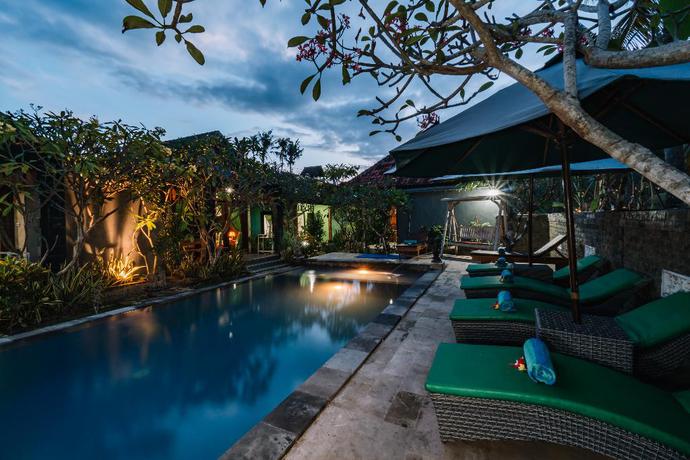 Imagen de la piscina del Hotel D and B Bungalow's By Dewizz Management. Foto 20