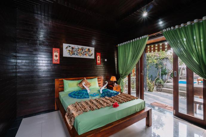 Imagen de la habitación del Hotel D and B Bungalow's By Dewizz Management. Foto 11