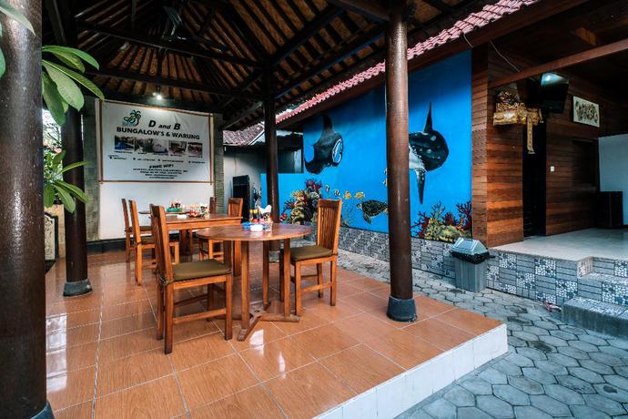 Imagen del bar/restaurante del Hotel D and B Bungalow's By Dewizz Management. Foto 2