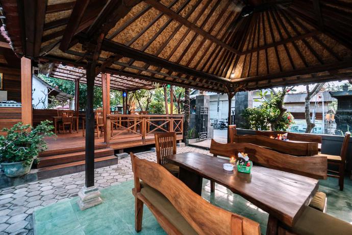 Imagen del bar/restaurante del Hotel D and B Bungalow's By Dewizz Management. Foto 4