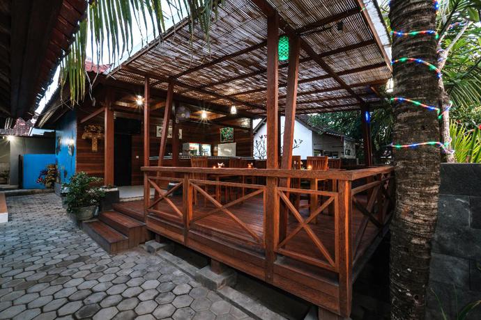 Imagen del bar/restaurante del Hotel D and B Bungalow's By Dewizz Management. Foto 9