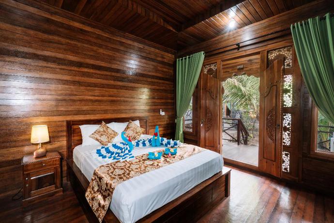 Imagen de la habitación del Hotel D and B Bungalow's By Dewizz Management. Foto 16