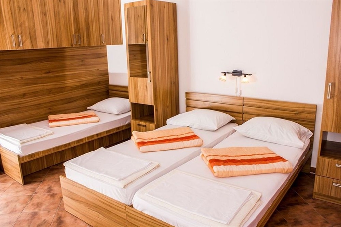 Imagen de la habitación del Hotel D and Sons Apartments. Foto 2