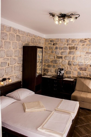 Imagen de la habitación del Hotel D and Sons Apartments. Foto 5