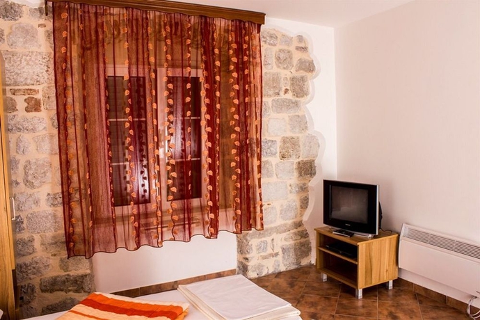 Imagen de la habitación del Hotel D and Sons Apartments. Foto 6