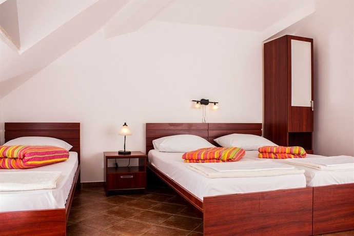 Imagen de la habitación del Hotel D and Sons Apartments. Foto 7