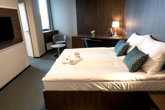 Imagen de la habitación del Hotel D1. Foto 9