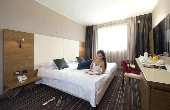 Imagen de la habitación del Hotel D120. Foto 12