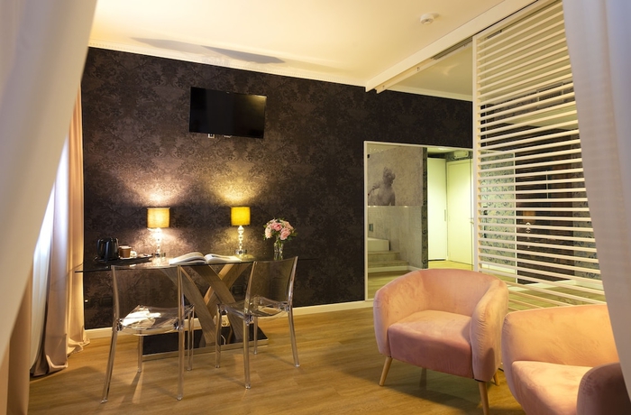 Imagen de la habitación del Hotel D120. Foto 17