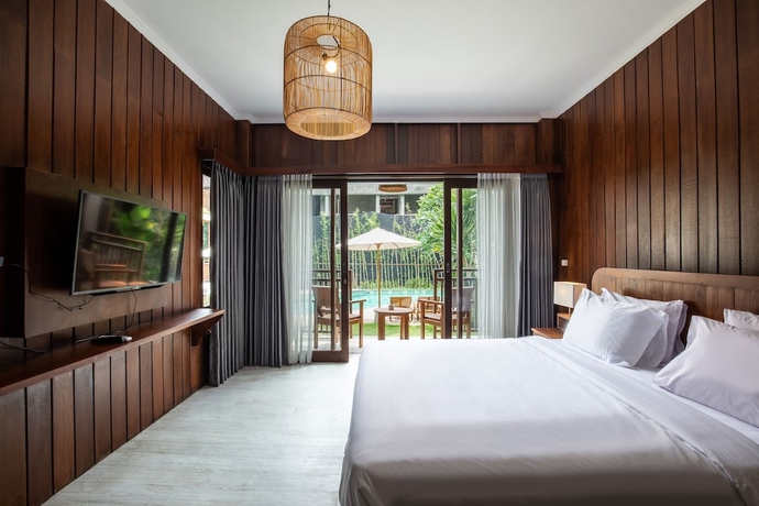 Imagen de la habitación del Hotel DADEKA Canggu. Foto 2