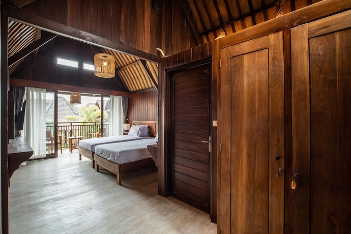 Imagen de la habitación del Hotel DADEKA Canggu. Foto 8