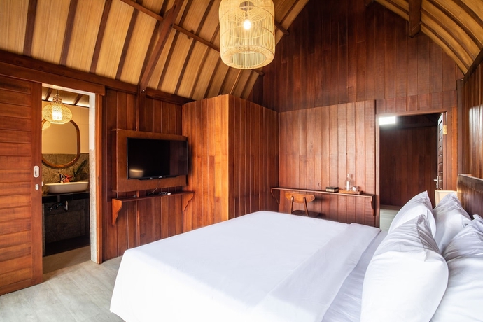 Imagen de la habitación del Hotel DADEKA Canggu. Foto 11