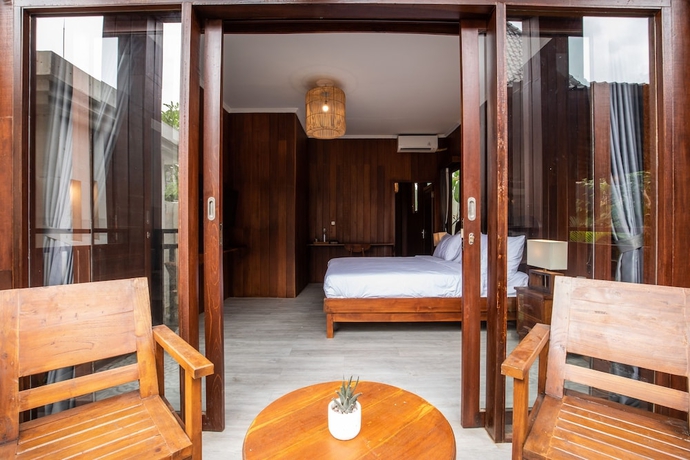 Imagen de la habitación del Hotel DADEKA Canggu. Foto 14