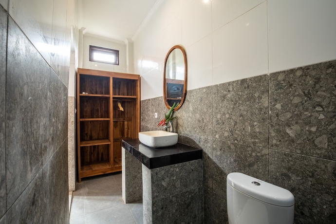 Imagen de la habitación del Hotel DADEKA Canggu. Foto 16