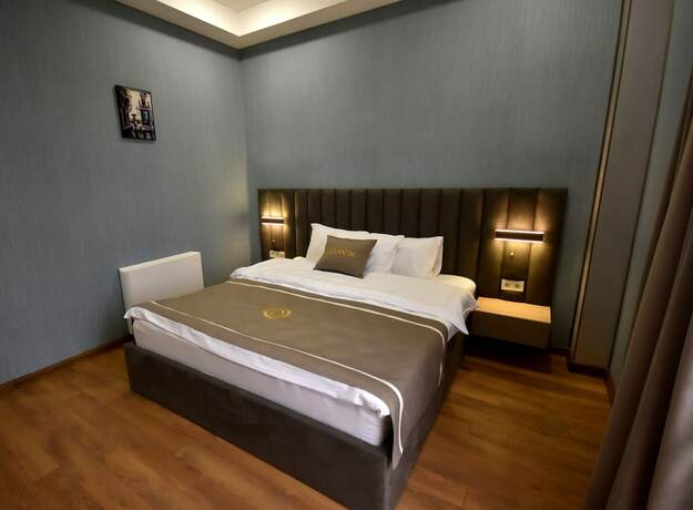 Imagen de la habitación del Hotel DADIANI Inn. Foto 11