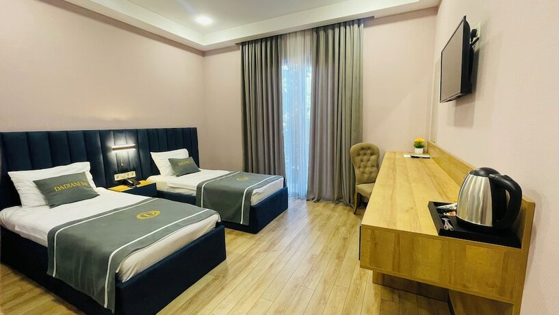 Imagen de la habitación del Hotel DADIANI Inn. Foto 16