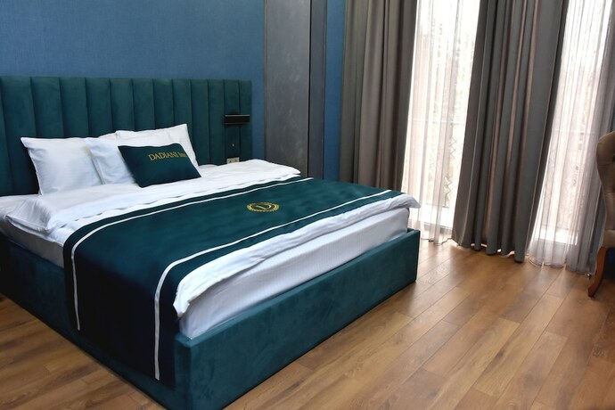 Imagen de la habitación del Hotel DADIANI Inn. Foto 20
