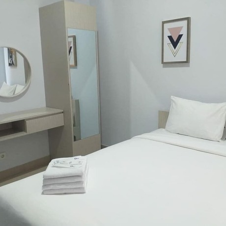 Imagen de la habitación del Hotel DAIMA Syariah Mansion Tebet. Foto 16