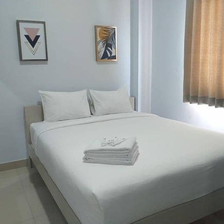 Imagen de la habitación del Hotel DAIMA Syariah Mansion Tebet. Foto 18
