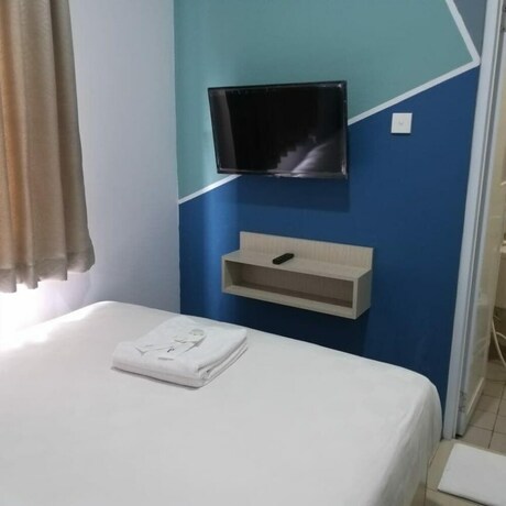 Imagen de la habitación del Hotel DAIMA Syariah Mansion Tebet. Foto 19