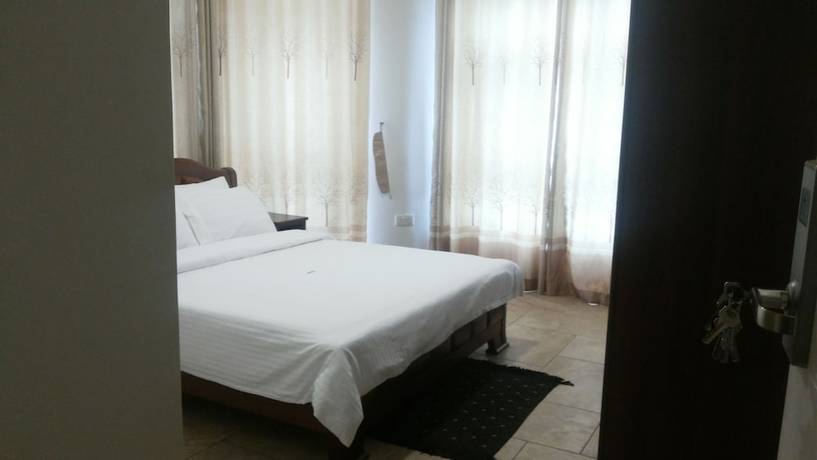 Imagen de la habitación del Hotel DAKS HOTEL KIRINYA. Foto 11