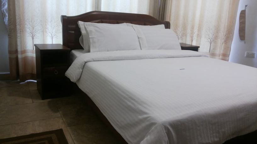Imagen de la habitación del Hotel DAKS HOTEL KIRINYA. Foto 13