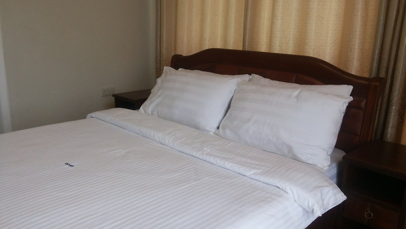 Imagen de la habitación del Hotel DAKS HOTEL KIRINYA. Foto 15