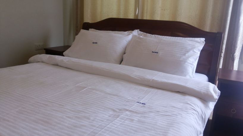 Imagen de la habitación del Hotel DAKS HOTEL KIRINYA. Foto 16
