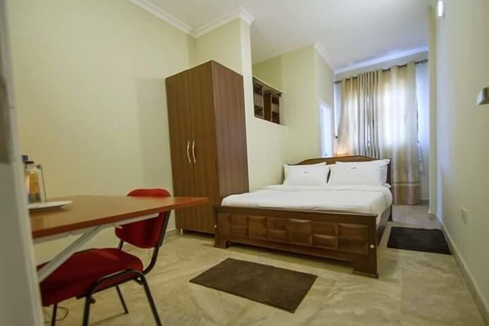 Imagen de la habitación del Hotel DAKS HOTEL KIRINYA. Foto 19