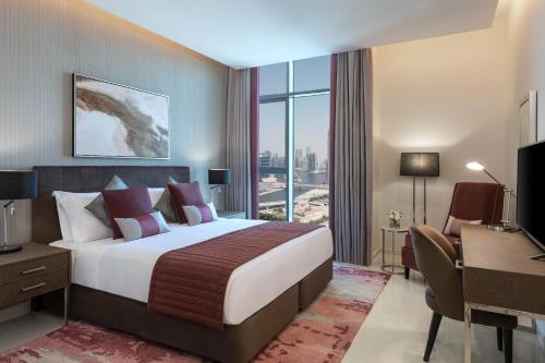 Imagen de la habitación del Hotel DAMAC Maison Aykon City Dubai. Foto 15