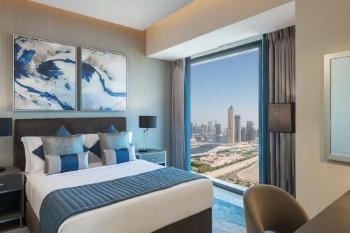 Imagen de la habitación del Hotel DAMAC Maison Aykon City Dubai. Foto 17