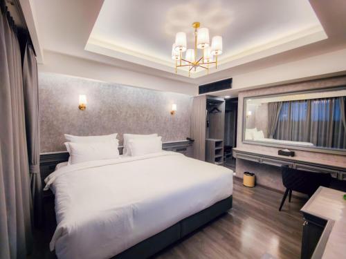 Imagen de la habitación del Hotel DAMNERNPAWA. Foto 14