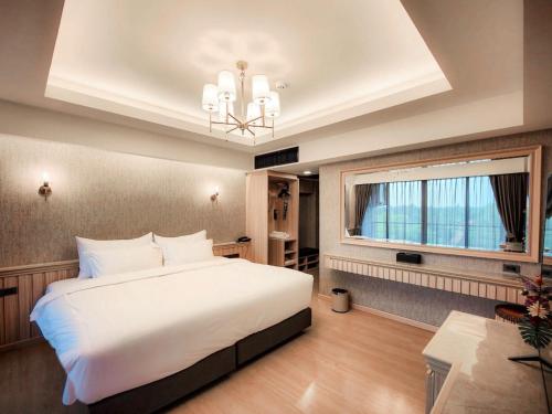 Imagen de la habitación del Hotel DAMNERNPAWA. Foto 16