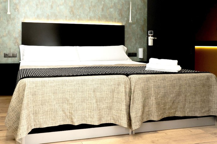 Imagen de la habitación del Hotel DAOS Suites Terrace Marbella. Foto 18