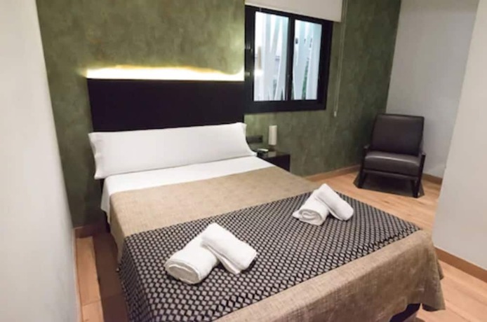 Imagen de la habitación del Hotel DAOS Suites Terrace Marbella. Foto 19